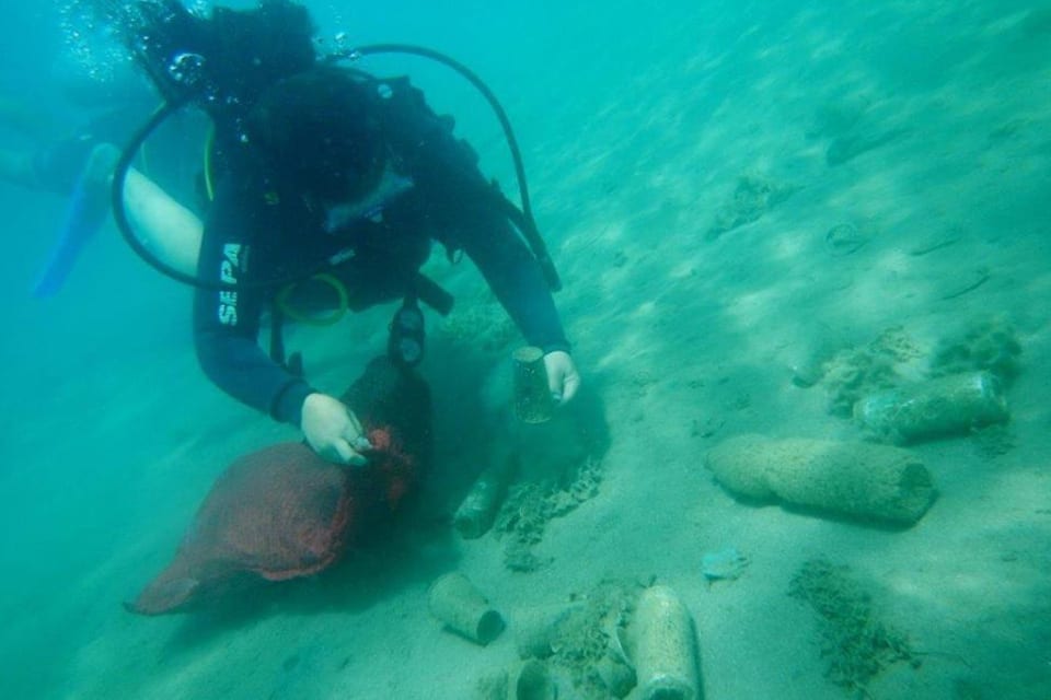 Eilat Gulf Ranger Diver cleaning the ocean bottom in cleaning dive in Eilat